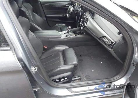 2018 BMW M5 z USA, uszkodzony, nr VIN WBSJF0C51JB282593